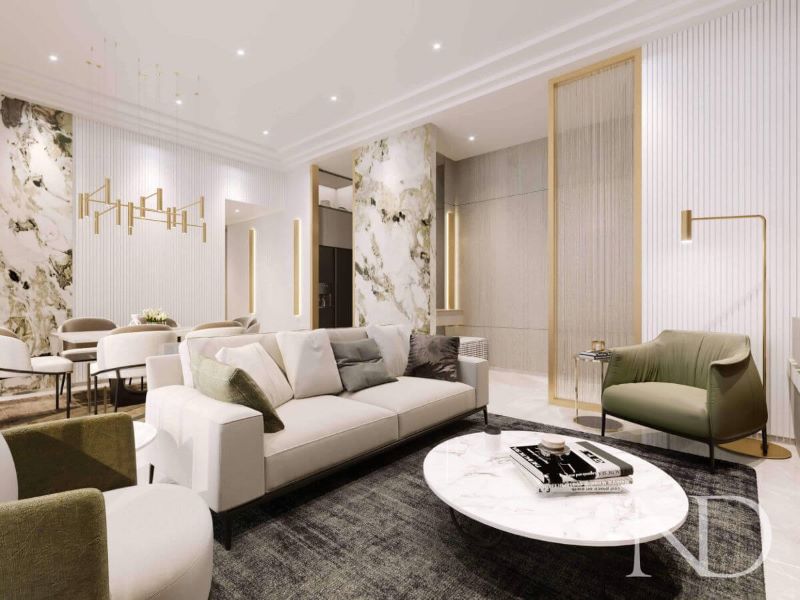 living room design by Nitido Design with golden details