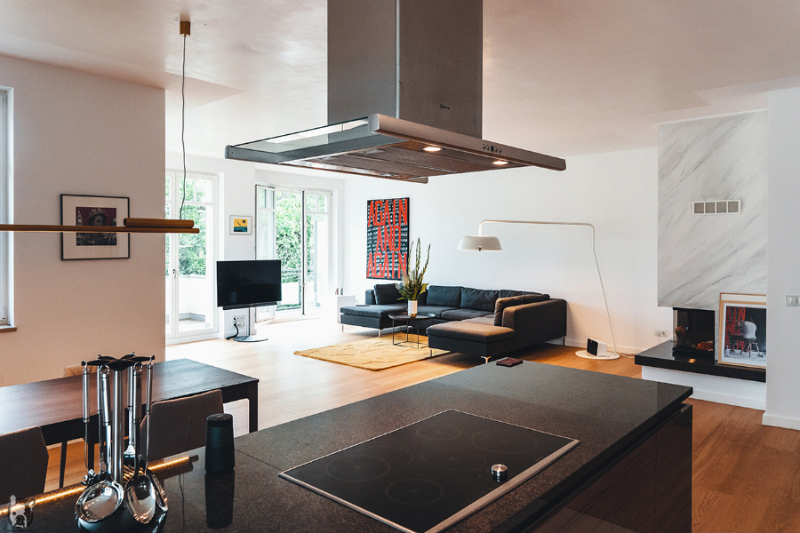 The Best Interior Designers of Germany, Otto von berlin look into a modern living room with a black sofa