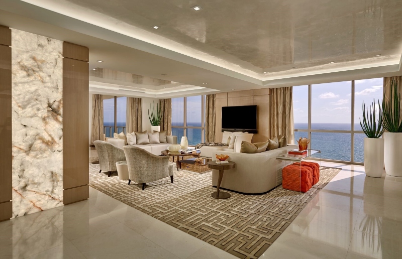 At The Mansions at Acqualina, a spectacular 9,218 square foot full-floor tower suite is for sale. It was entirely designed by Interiors by Steven G.